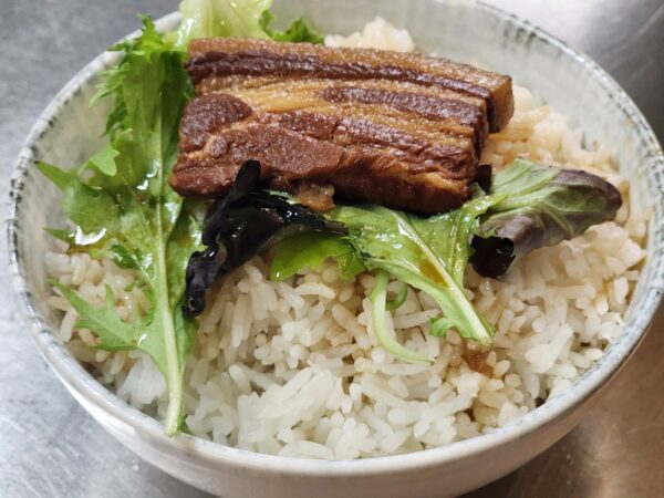 Steamed rice with honey soy pork belly sauce