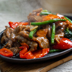 Sizzling beef steak fillet with black pepper