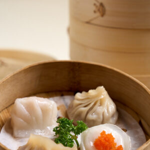 Steamed dumplings platter with scallops, prawns, wagyu champagne & soup pork