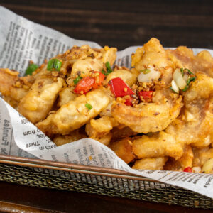 Salt and pepper pork ribs boneless tossed with garlic & shallots