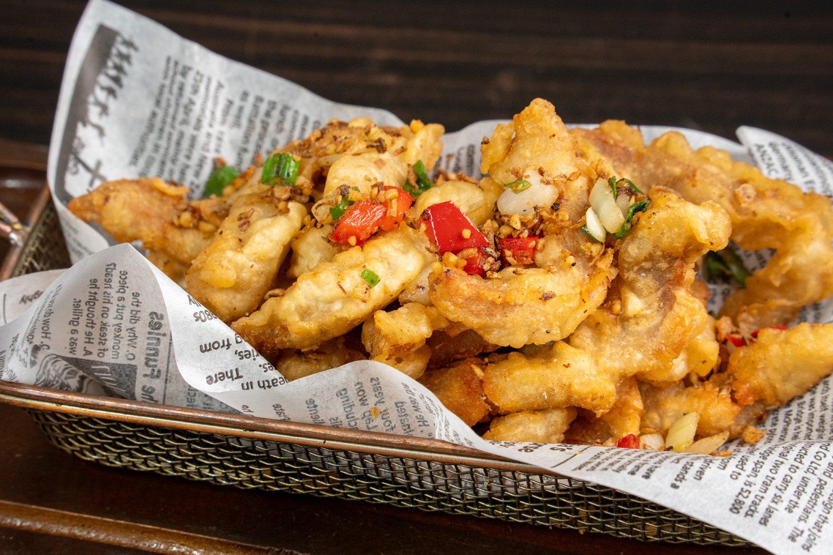 Salt and pepper pork ribs boneless tossed with garlic & shallots